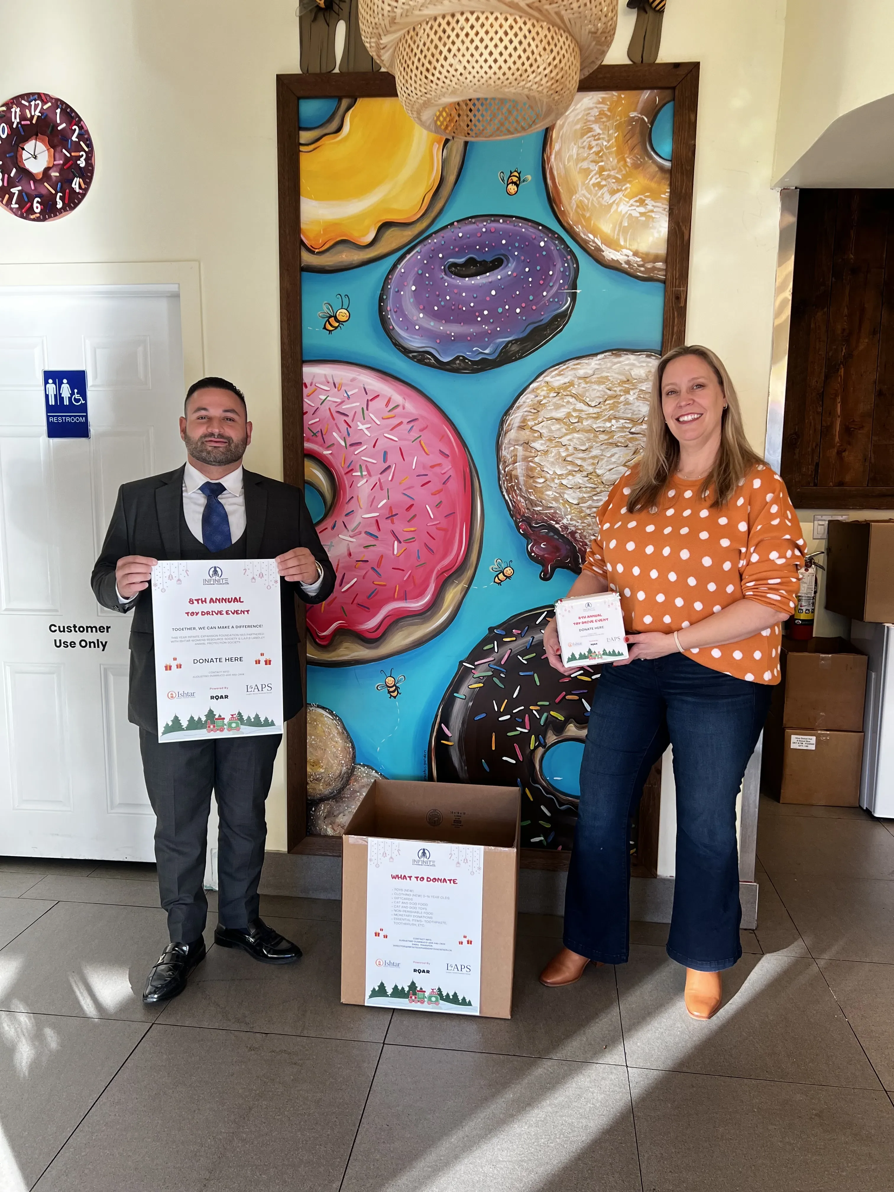 The Hive Donut Hut team out at a local community event.